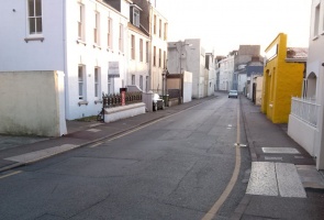 Simon Place, the eastern continuation of Belmont Road. The granite slabs in the pavements cover the brook passing underneath