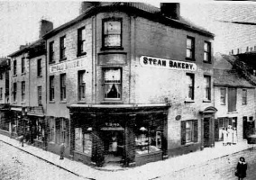 Bird's steam bakery on the corner of New Street and Burrard Street