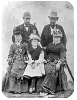 The Toy and Hodge families: back left, John Matthew Toy; front left, Mary Elizabeth Hodge, his wife; middle front, Jane Toy, their daughter; back right, William Hodge, father of Mary Elizabeth; front right: Grace Phillips, her mother