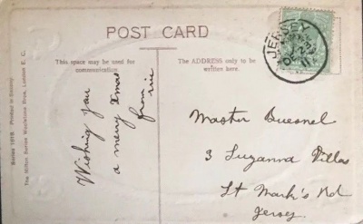 Christmas greetings in 1911 to Master Buesnel. This was Philip George Buesnel, aged two at the time, the son of Philip and Georgina Bertram, nee Jeune. The couple were married in Grouville in 1904 and had a daughter Georgina, baptised in 1912. There is no baptism record for Philip George
