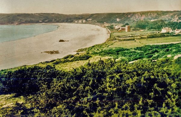 This tinted photograph shows that before the bay was developed for tourism, it was a fertile, coastal plain with a network of small fields, as well as dunes and heath land