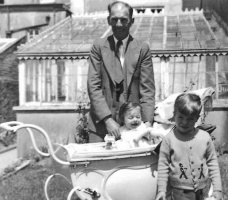 With younger brother John and their father