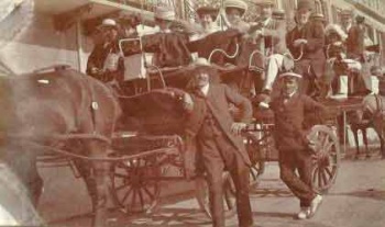 A charabanc waits at Gorey