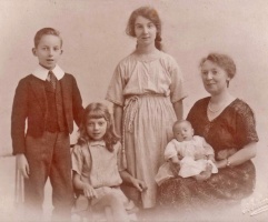 Evelyn Ruth Shepherd, nee Farrell, in 1922 with children Philip John, Phyllis Evelyn, Marjorie Constance and Sheila Madeleine. Philip John and Marjorie were born in Jersey while their father, Philip William Shepherd (1879-1953) was serving with the Army garrison regiment. This photograph was taken when the family lived in Plymouth
