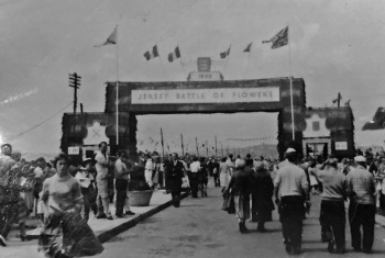 Said to be 1950, but the Battle of Flowers was not revived until 1951. And it must be later because the 1951 arch was a different design. The date on the arch probably reads 1959