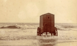 A solitary beach cabin which would have been towed into place by a horse