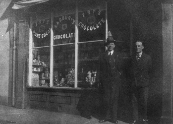 Leonard Skingle (right) outside the Ann Street shop