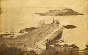 The construction of a pier in St Peter Port to join Castle Cornet, photographed by one of the Hugo family
