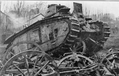 A captured tank being used to crush scrap