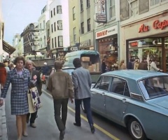 1969, and traffic and pedestrians still share the street outside Au Caprice, No 11