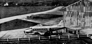A Jersey Airlines Heron boarding in 1958