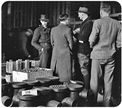 An auction of material left behind by the Germans