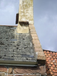 Dripstones on the chimney for the earlier thatched roof