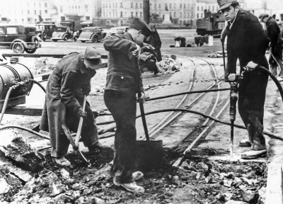 An Evening Post picture of German prisoners removing rail tracks in front of Commercial Buildings at St Helier Harbour in 1945