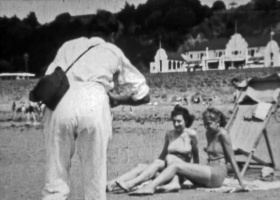 A beach photographer at work
