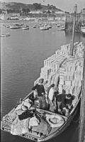 A shipment of tomato trays from France being unloaded at Gorey - 1959 Jersey Evening Post photograph