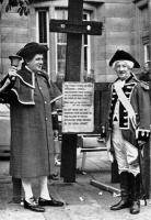 A town crier in the square during a Vier Marchi