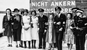 On the Albert Pier as the first to arrive are greeted by locals