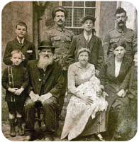 This photograph is believed to have been taken after the baptism of Redmond Ozard (1900-1969), son of John Henry and Alice Louisa, nee Woodward