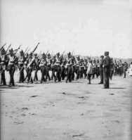 A militia parade on the beach, picture by amateur photographer Francis de Faye