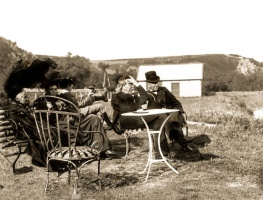 Unknown guests sitting outside the hotel