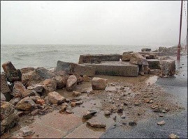 A 20th century storm shatters the seawall on Victoria Avenue, not for the first or the last time