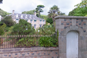 Little Grove, St Lawrence, with de Gruchy arms on the keystone of the pedestrian arch