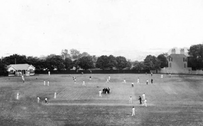 A cricket match in progress on College Field