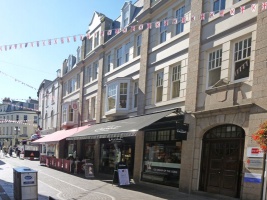 Into Queen Street, and this interesting row before the Snow Hill corner recalls the days when virtually every town shop had extending blinds to protect the window displays from the sun. I wonder if those two angular bay windows are original