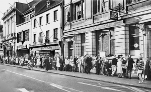 A queue stretches along Broad Street outside the Post Office there