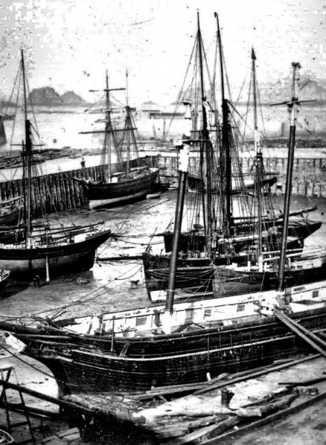We featured this photograph as our Picture of the Week at the end of March 2016, and suggested that it might be the oldest surviving outdoor photograph of Jersey. A few weeks later a slightly different version surfaced in France, where it was offered for sale at 65 euros. It is described as circa 1870. We believed then that the photograph was probably taken some 20 years earlier. 2024 update: However, a copy of the other photograph appeared on an auction site in 2024 (below) and this revealed that the picture was published as a carte de visite by Asplet and Green, prominent photographers who did not go into business in St Helier until 1866, which indicates that the original estimate of 1870 was not far off the mark