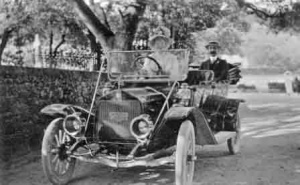 An early car on island roads