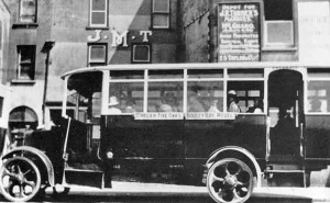 An early JMT bus outside the company's depot