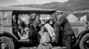 A family and their chauffeur in the 1920s