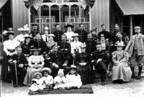 Militiamen and their families relax at Pooley's, Greve de Lecq