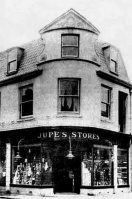 Jupe's Stores, grocers, at 18 Burrard Street on the corner with Halkett Place, about 1913