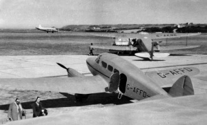 A Percival Petrel and de Havilland Rapide behind
