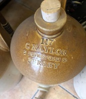 A cider bottle sold by C Naylor