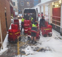 Postmen in the snow in 2013