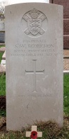 The grave of Great War casualty Sidney William Ecobichon at St Ouen's Churchyard, Jersey