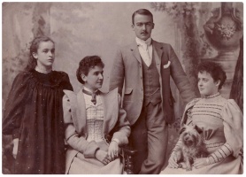 Clara Evelyn Falla, nee Cave, with her younger sister Miriam, her mother Ada and an unknown man