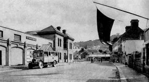 A bus outside the St Aubin terminus, competing for business