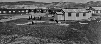 The Lieutenant Governor received instructions to construct a prisoner of war camp in Jersey soon after the war began. Les Blanches Banques in St Ouen’s Bay was chosen as the location, on land already owned by the War Office. This image shows part of the camp in March 1915, the month during which the first prisoners arrived.