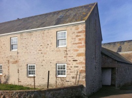 To the south of the courtyard is what is believed to have been the original house, Vale Cottage, the oldest part of the property. It can be seen that the doorway was bricked up when this building was converted to a cowshed with farm storage above