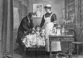 Members of an unidentified Ahier family pose for a studio portrait
