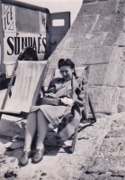 An unknown 'Auntie Dorothy' relaxes on an unidentified Jersey slipway