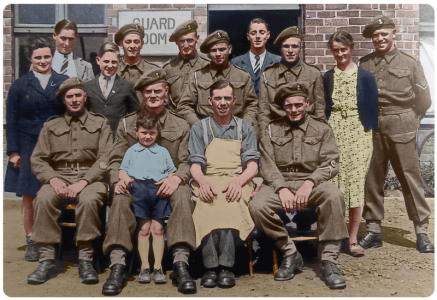 The liberators and the liberators. British troops join locals for a group photograph in May 1945