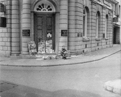 Newspapers used to be sold on a Sunday outside Lloyds Bank