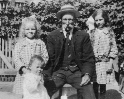James Hibbs (1859-1920) with grandchildren Madeleine, Beryl and Rosalie in 1917