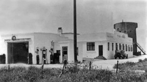 High Tower. The garage and two bungalows were built in the 1930s by Leonard Taylor. The tower was destroyed by the Germans during the Occupation.
